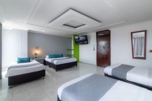 Cama o camas de una habitación en Hotel Elegant Suite