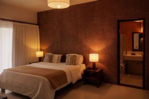 Katil atau katil-katil dalam bilik di Hotel Maitei