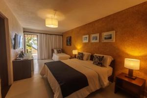 Katil atau katil-katil dalam bilik di Hotel Maitei