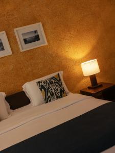 Katil atau katil-katil dalam bilik di Hotel Maitei