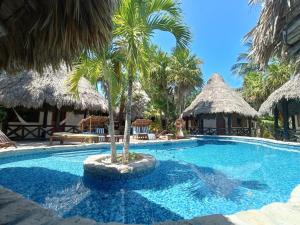 Bazén v ubytování Holbox by Xaloc nebo v jeho okolí