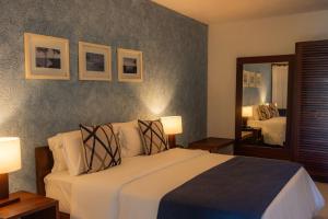 Katil atau katil-katil dalam bilik di Hotel Maitei