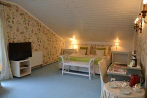 Ένα ή περισσότερα κρεβάτια σε δωμάτιο στο Christian Gartenhotel