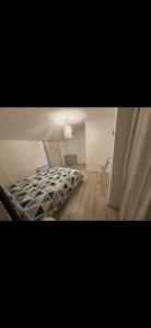 Postel nebo postele na pokoji v ubytování Maison flanc de coteau + 4 fotografie