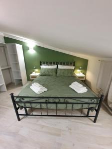 En eller flere senge i et værelse på La Casina Verde