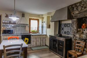 Nhà bếp/bếp nhỏ tại La Terrazza di Tranci