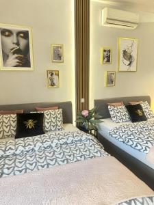 Posteľ alebo postele v izbe v ubytovaní Exclusive Apartments Smolna