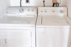 two white appliances in a kitchen next to each other at 2 Beautiful 1 BR Apartment - Central CT in Plainville