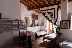 Postel nebo postele na pokoji v ubytování Hostel Argonauta
