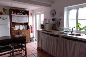 Kuchyň nebo kuchyňský kout v ubytování Hostel Argonauta