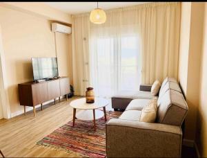 Μια τηλεόραση ή/και κέντρο ψυχαγωγίας στο Damis Apartment Port