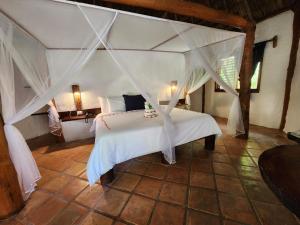 Postel nebo postele na pokoji v ubytování Holbox by Xaloc + 37 fotografií