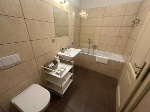 Kúpeľňa v ubytovaní Pension Faber