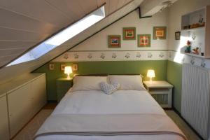 Ένα ή περισσότερα κρεβάτια σε δωμάτιο στο moserp