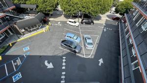 an aerial view of cars parked in a parking lot at Inn On Grove in San Francisco