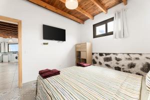 Postel nebo postele na pokoji v ubytování Mar Azul, Panorama View Apto de Oasis Vasiliko , La Asomada