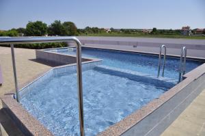 a hot tub on the side of a building at Vila in Lavanda in Fažana