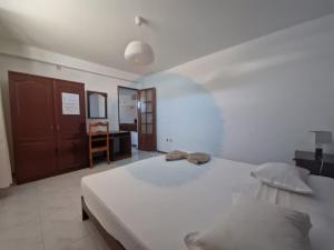 Postel nebo postele na pokoji v ubytování Residencial Raiar