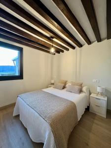 Postel nebo postele na pokoji v ubytování Casa Cuartel