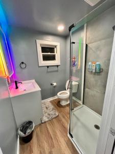a bathroom with a shower and a toilet at GameZone in Sparks