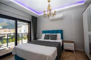 Ένα ή περισσότερα κρεβάτια σε δωμάτιο στο Villa Deniz +22 φωτογραφίες