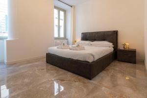 Postelja oz. postelje v sobi nastanitve Magic Place Bergamo! Classy Apartment in the heart of the city