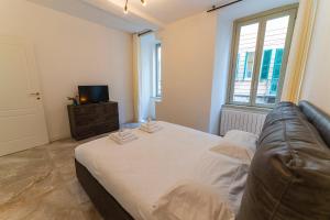 Postelja oz. postelje v sobi nastanitve Magic Place Bergamo! Classy Apartment in the heart of the city