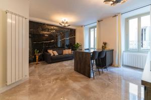 Predel za sedenje v nastanitvi Magic Place Bergamo! Classy Apartment in the heart of the city