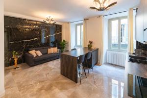 Predel za sedenje v nastanitvi Magic Place Bergamo! Classy Apartment in the heart of the city