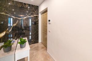 Kopalnica v nastanitvi Magic Place Bergamo! Classy Apartment in the heart of the city + 37 fotografij