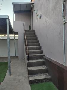 a stairway leading up to a building at Don Oscar Alojamientos Dpto Sol in San Justo