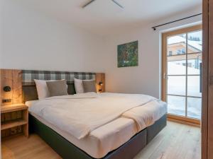 Posteľ alebo postele v izbe v ubytovaní Haus Enzian