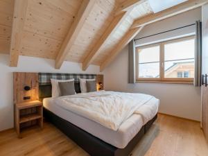 Posteľ alebo postele v izbe v ubytovaní Haus Enzian
