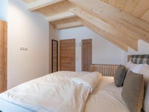 Posteľ alebo postele v izbe v ubytovaní Haus Enzian