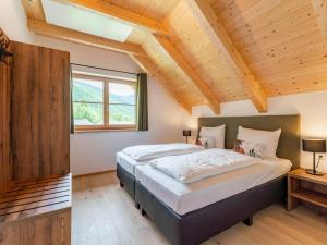 Postel nebo postele na pokoji v ubytování Chalet Amsel