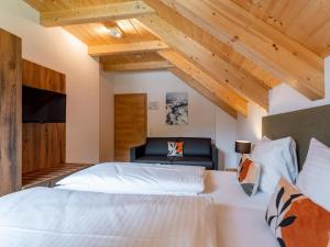 Postel nebo postele na pokoji v ubytování Chalet Amsel