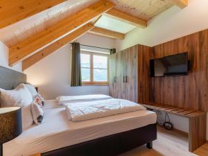 Postel nebo postele na pokoji v ubytování Chalet Amsel