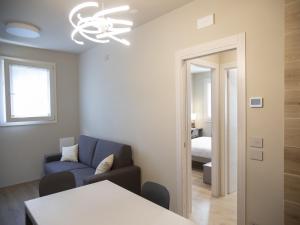 Ένα ή περισσότερα κρεβάτια σε δωμάτιο στο Stylish Duplex in Verbania