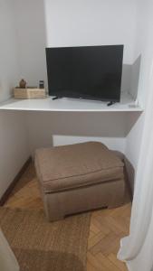 Μια τηλεόραση ή/και κέντρο ψυχαγωγίας στο Dos Ambientes Deluxe Concordia Centro