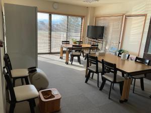 TV a/nebo společenská místnost v ubytování Hotel Morimotoya 板野店