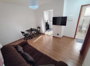 TV/trung tâm giải trí tại Apartamento Tranquilidade!