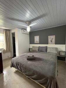 Ένα ή περισσότερα κρεβάτια σε δωμάτιο στο Apartamento em Tucuns
