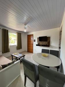 Χώρος καθιστικού στο Apartamento em Tucuns