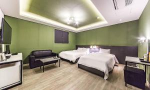 Postel nebo postele na pokoji v ubytování Chuncheon Hotel View