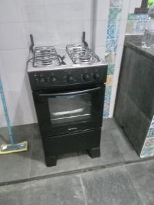 Η κουζίνα ή μικρή κουζίνα στο Residencial Fanor