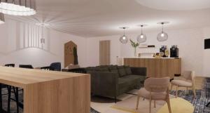 ディーゲムにあるHilton Garden Inn Brussels Airportのソファとテーブルのあるリビングルーム