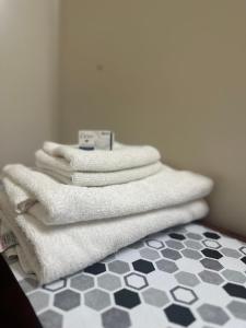 En eller flere senge i et værelse på Comfort Corner