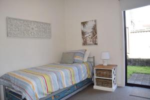 Katil atau katil-katil dalam bilik di Watermark Apartment 2 - Bring your own linen.