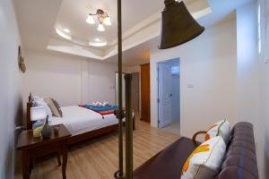 Katil atau katil-katil dalam bilik di 3 Bedroom Villa in Good Location - CH88