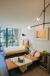 Ένα ή περισσότερα κρεβάτια σε δωμάτιο στο Evie House